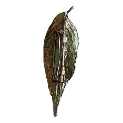 Broche feuille vintage dorée, finition brillante, bijou signé, style naturel