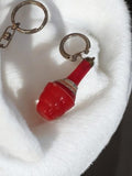 Porte-clés vintage bouteille rouge rétro accessoire publicitaire ancien