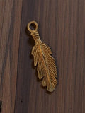 Pendentif plume vintage métal doré années 50 bijou rétro deadstock