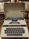 Machine à écrire Petite Super International vintage, rétro beige, AZERTY ancien