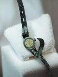 Montre bracelet mécanique vintage années 1930 à restaurer, cadran clair ancien