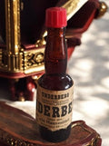 Bouteille ancienne Underberg vide ambrée capsule rouge vintage alcool déco