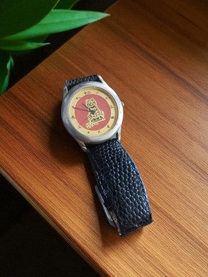 Montre vintage femme cadran tigre chiffres japonais bracelet noir rétro