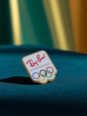Pin's vintage Ray-Ban émail Jeux Olympiques années 80 badge logo pub
