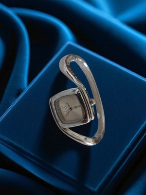 Montre femme Spiral vintage à restaurer design années 70 argenté rétro