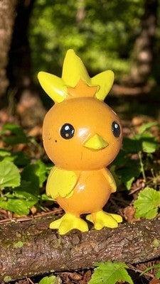 Figurine Pokémon Poussifeu PVC orange jaune 2005 2006 jouet R/LW