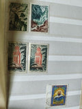 Lot anciens timbres Algérie à trier, motifs paysages, architecture et portraits