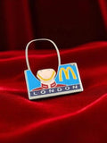Pin's vintage émaillé McDonald's London années 80, logo, casque, publicitaire