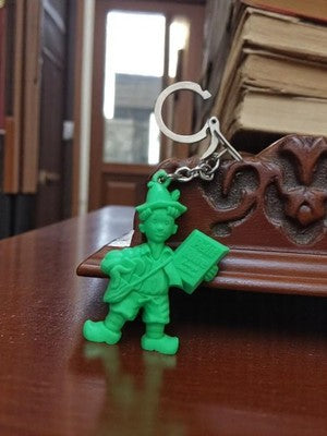 Porte-clés vintage Petit Livre vert publicitaire rétro, figurine plastique