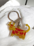 Porte-clés publicitaire ancien vache MONTEIL jaune rouge vintage rétro accessoir