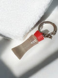 Porte-clés ancien rétro flacon miniature bouchon rouge vintage accessoire