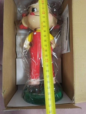 Figurine Peko-chan Fujiya vintage sur socle rouge jaune avec boîte Japon