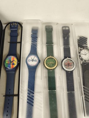 Gros lot de montres publicitaires vintage quartz, étuis, logos années 1990 varié