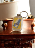Porte-clés publicitaire vintage Café Una France, rectangulaire, jaune bleu rétro