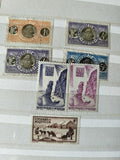 Lot anciens timbres Saint-Pierre-et-Miquelon vintage à trier, motifs variés, occ