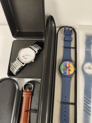 Gros lot de montres publicitaires vintage quartz, étuis, logos années 1990 varié