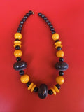 Ancien collier vintage bakélite grosses perles noires et jaunes rétro années 30-