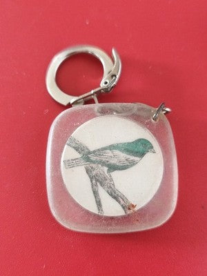Porte-clés ancien publicitaire vintage oiseau illustré carré rétro collection