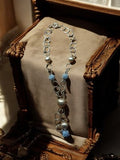 Bracelet vintage fantaisie à breloques boules argentées et bleues, chaîne large