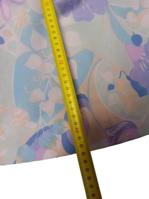 Robe femme vintage à bretelles nouées, motif fleuri pastel rétro