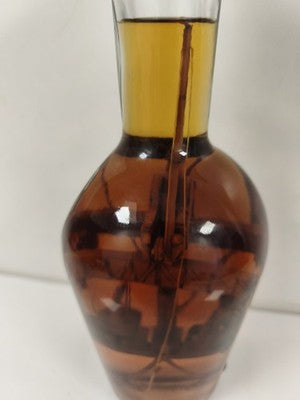 Ancienne bouteille Old Smuggler verre ambré personnage bois interne