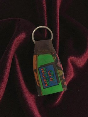 Porte-clés publicitaire NEON KID vintage rétro années 80 objet d’occasion