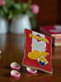 Pin's Flodor émail vintage années 80 chips publicitaire rouge jaune