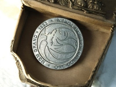 Jeton casino MGM Grand 1993 métal, 1 dollar, vintage Las Vegas, token