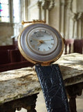 Luc Desroches women's vintage quartz watch, gold dial, black strap