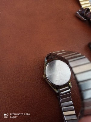 Montre vintage Domi Quartz cadran bleu, bracelet extensible, ancien