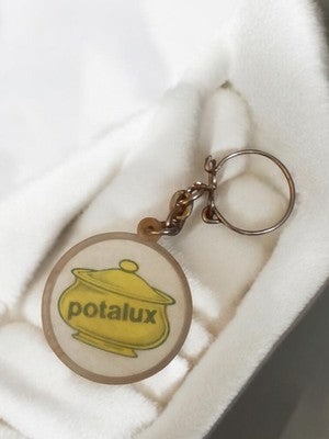 Porte-clés publicitaire ancien Potalux rond vintage rétro jaune logo cuisine