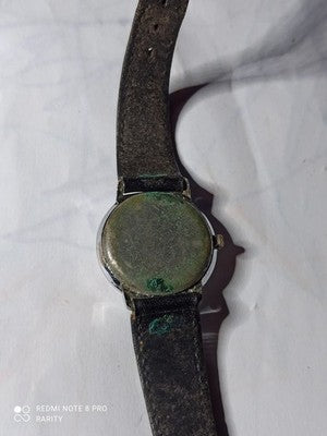 Montre femme Elvia Paris quartz ancien cadran blanc dateur vintage
