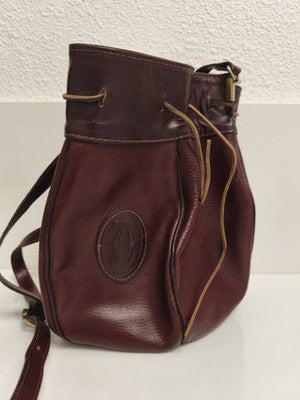 Sac seau Cartier bordeaux en cuir logo ovale, bandoulière, sac à main femme