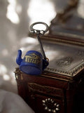 Porte-clés vintage publicitaire Thé Tetley théière bleue rétro années 70