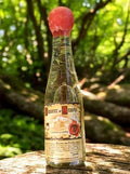 Mini-bouteille Liqueur des Aravis vintage Savoie, cire rouge, étiquette d'origin