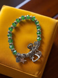 Bracelet breloques perles vertes et argenté style rétro fantaisie femme vintage