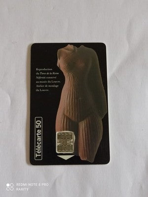 Télécarte 50 unités Torse Nefertiti Louvre vintage carte téléphonique Égypte
