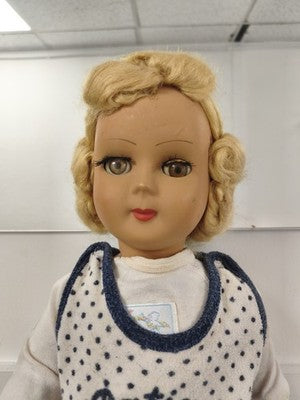 Poupée ancienne marque Ancienne, blonde, yeux bruns, tenue bleu marine