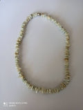 Collier vintage années 80 en perles fantaisie irrégulières, tons ivoire, rétro