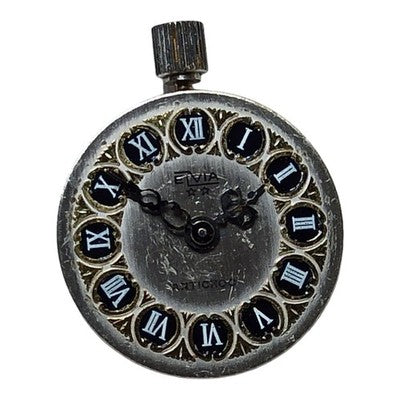 Montre mécanique Elvia vintage cadran décoré chiffres romains rétro