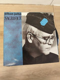 Vinyle 45T vintage Elton John Sacrifice pochette originale bleu et noir