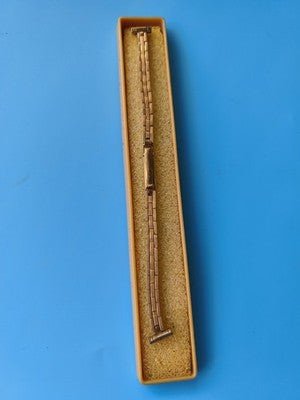 Bracelet montre ancien vintage français, neuf stock, couleur dorée, rare