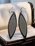 Paire boucles d'oreilles vintage pendantes strass argenté motif feuille