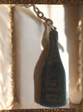 Porte-clés bouteille Pierre Moncuit Mesnil publicitaire vintage alcool France