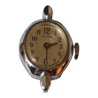 Montre femme vintage Kelton, cadran crème, boîtier chromé ancien