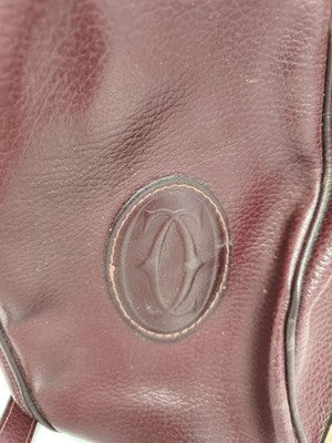 Sac seau Cartier bordeaux en cuir logo ovale, bandoulière, sac à main femme