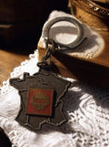 Porte-clés vintage Shell France rétro, accessoire publicitaire ancien