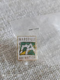 Pin's MARSEILLE ANIMATION vintage ancien logo émaillé rare badge rétro