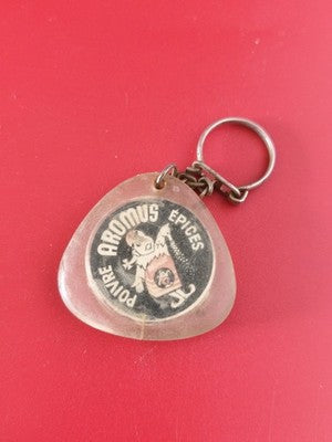 Ancien porte-clés publicitaire vintage Aromus épices forme triangle transparent