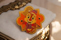 Pin’s Tokyo Disneyland Tic Tac orange doré – Disney souvenir rare Japon